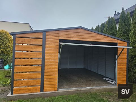 Garaż jednostanowiskowy drewnopodobny przy domu